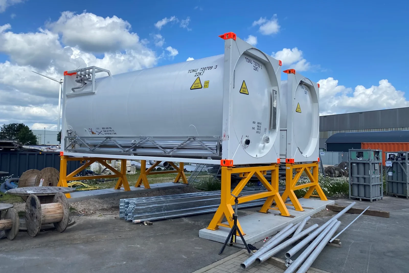 Bofort 20 ft cryogenic ISO tank containers with ISO corner castings, standing on trestles