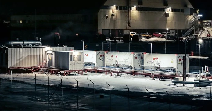Bofort ISO tank containers at the biomethane supply installation on Spitsbergen at night