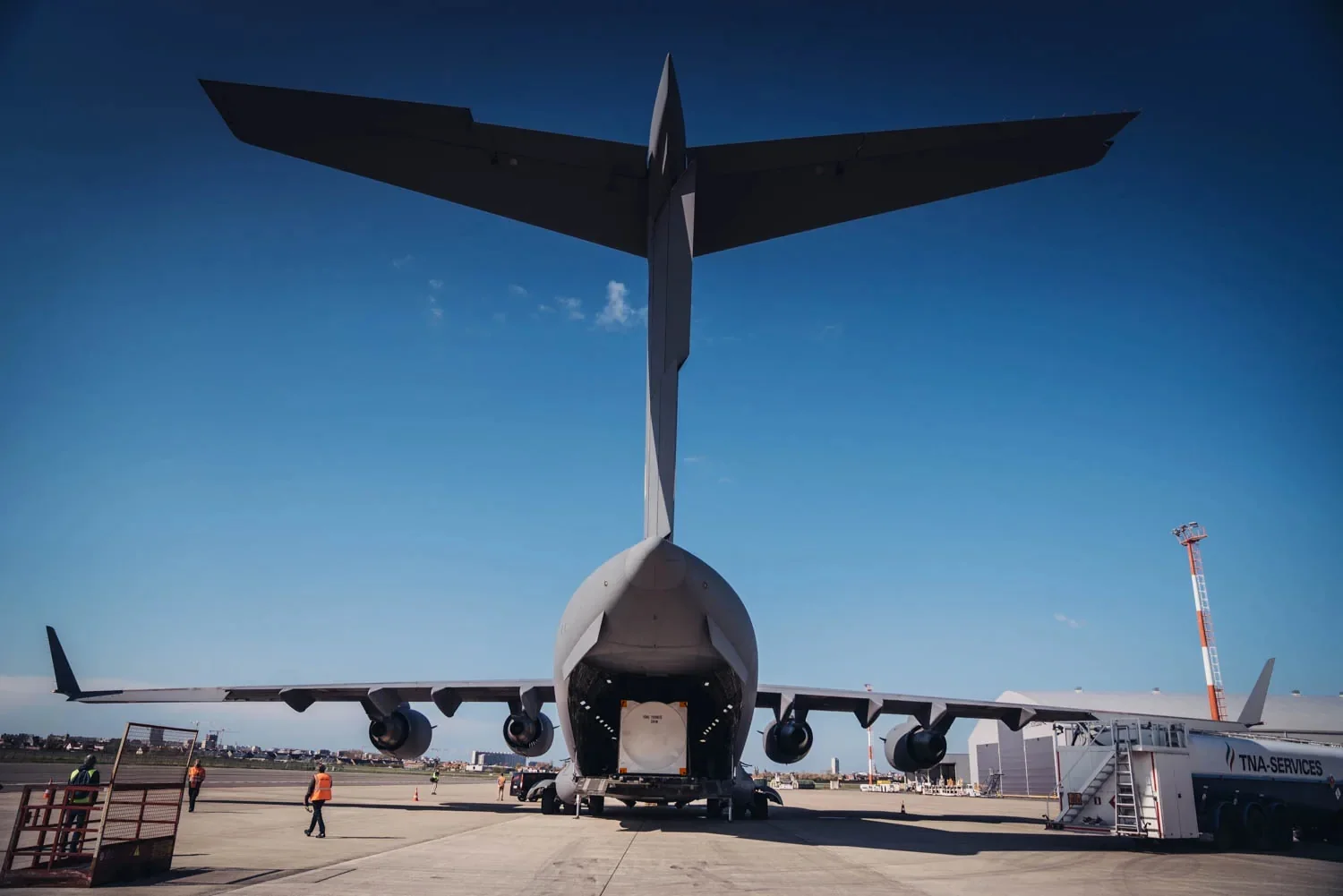 Bofort oxygen ISO tank being loaded through the rear ramp of the Indian Air Force C-17 at Ostend Airport